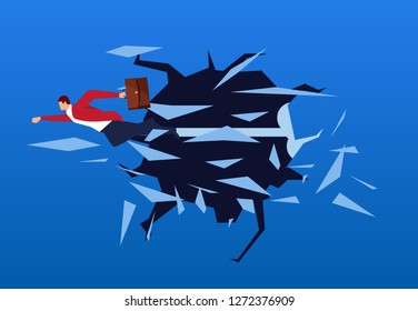Businessman breaks out of the wall