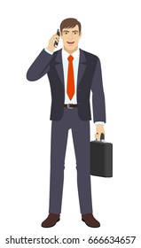  Businessman with briefcase talking on the mobile phone. Full length portrait of businessman character in a flat style. Vector illustration.
