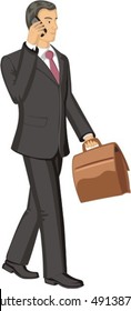 businessman with briefcase talks on telephone