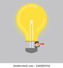 Businessman in a bulb balloon with telescope looking out