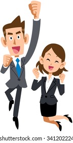 Businessman and business woman celebrates by jumping up