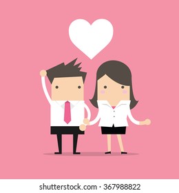 Businessman and Businesswoman feeling love in office