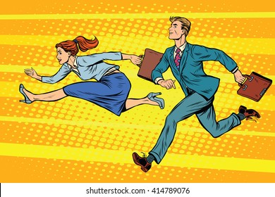 Businessman and businesswoman running competition