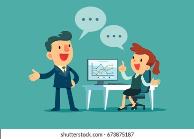 Businessman and businesswoman working together discussing business strategy at office desk.