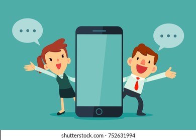 Businessman and businesswomen talking beside smart phone with blank screen. Business communication concept.