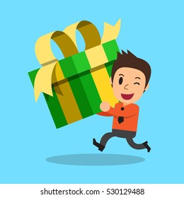 Businessman carrying big gift box