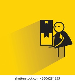 businessman carrying boxes stick figure icon with shadow yellow background