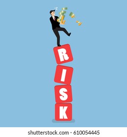 Businessman Carrying His Money On Shaky Risk Blocks. Investment Risk Concept