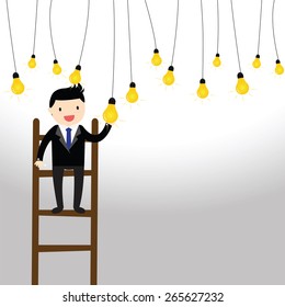 Businessman catching a light bulb