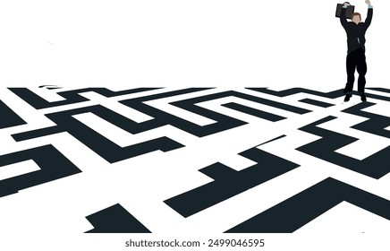 Businessman celebrating while standing over maze puzzle