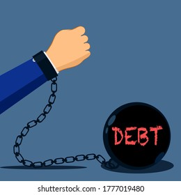 businessman chained and shackled to a big debt weight. Holding and dragging heavy ball in arms