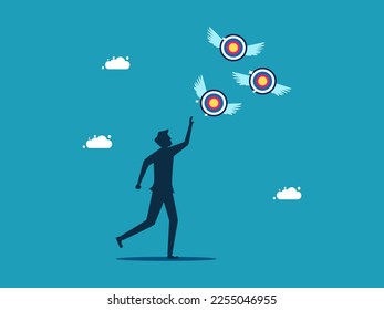 Businessman chasing a target flying away from him. Failing goals and finding goals. business concept 