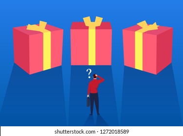 Businessman chooses from three boxes