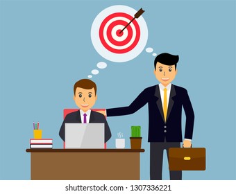 Businessman or a clerk working at her office desk