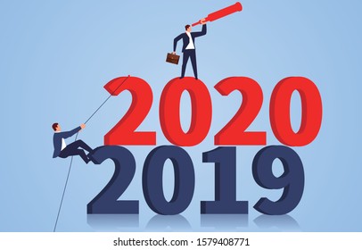 Businessman climbing numbers 2020 and looking to the future