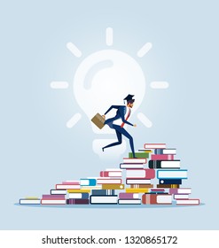 Businessman climbing to the top of book piles