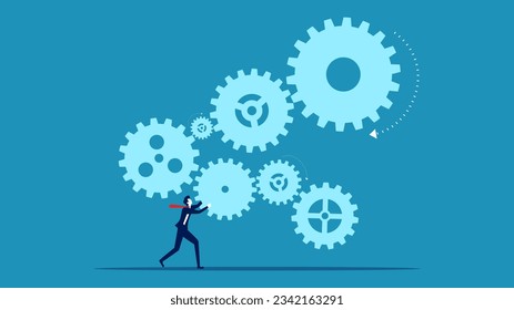 Businessman complete connection of gear mechanism. Integrate concept 