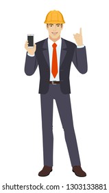 Businessman in construction helmet holding mobile phone and pointing up. Full length portrait of businessman in a flat style. Vector illustration.