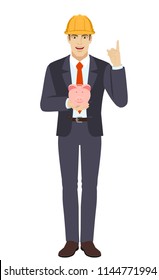 Businessman in construction helmet holding a piggy bank and pointing up. Full length portrait of businessman in a flat style. Vector illustration.
