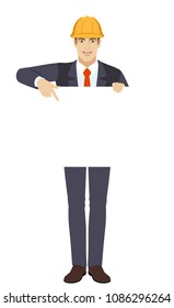 Businessman in construction helmet pointing at banner over white. Full length portrait of businessman character in a flat style. Vector illustration.