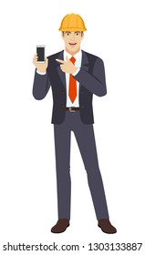 Businessman in construction helmet pointing at a mobile phone. Full length portrait of businessman in a flat style. Vector illustration.