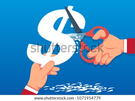 Businessman cuts a dollar with scissors