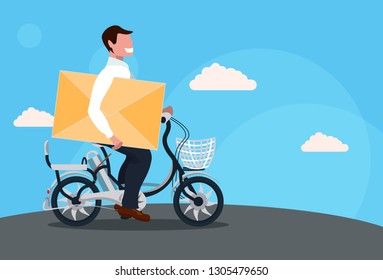 businessman cycling bicycle holding closed letter envelope paper correspondence delivery concept guy riding bike male cartoon character full length horizontal flat