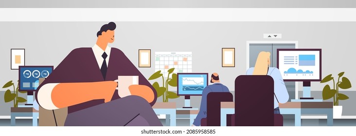 businessman drinking coffee business man having coffee break office interior horizontal portrait