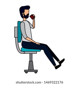 businessman drinking coffee seated in office chair