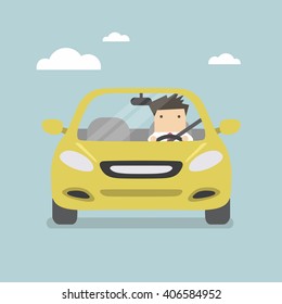 Businessman driving yellow car on the road