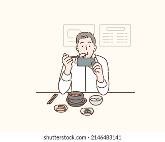 Businessman eating lunch at Korean restaurant. Hand drawn style vector design illustrations.