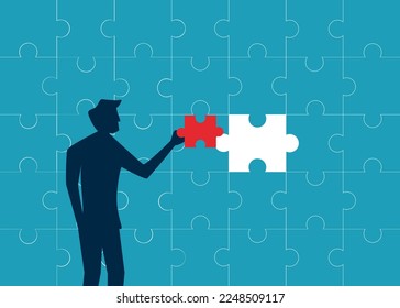 businessman encounters a problem that is bigger than expected. man solving jigsaw puzzle
