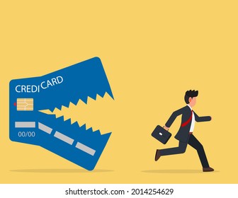 Businessman escape from the dangers of credit card debt. financial crisis concept