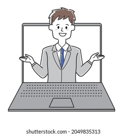 Un hombre de negocios explica en una pantalla de un portátil
