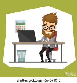 Businessman in eyeglasses is using a computer, smiling while working in office
