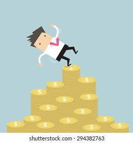 Businessman Falling Of Money Mountain