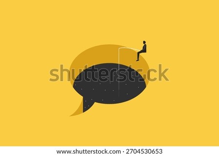 Businessman fishing while sitting in bubble chat