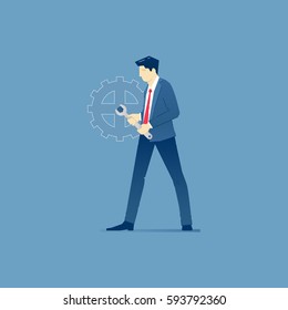 Businessman is fixing a giant cog as a business machine with a wrench. Vector illustration of fixing firm problem. Isolated on blue background