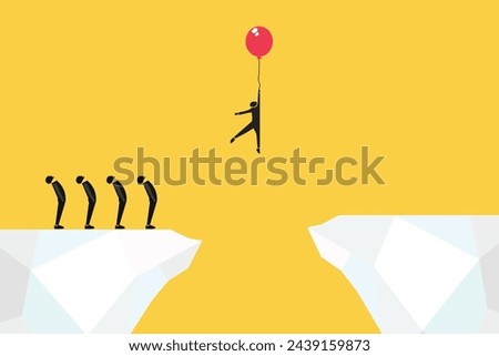 businessman fly with balloon through the gap. Concept of success, motivation, goal, professional growth