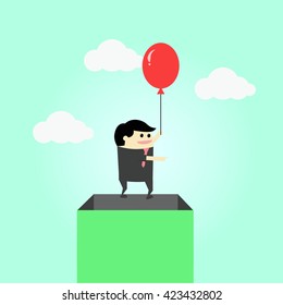 Businessman flying in air out of box going to freedom