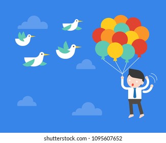 Businessman flying with balloon in sky, afraid birds poke his balloon, risk management concept