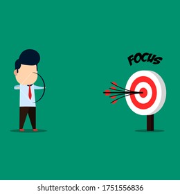 businessman focuses on shooting the bow at the target, illustrating the concept of ambition to achieve the goal