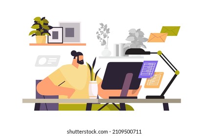 businessman freelancer sitting at workplace business man looking in computer monitor working process concept