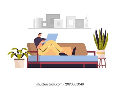 businessman freelancer working on laptop business man using notebook on sofa social media network communication