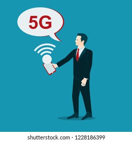 Businessman with gadget and speech bubble with text 5G symbol.