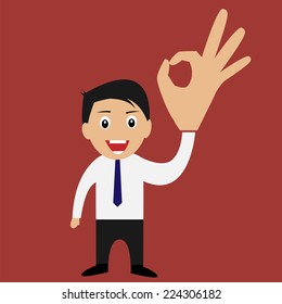 Businessman giving ok sign 