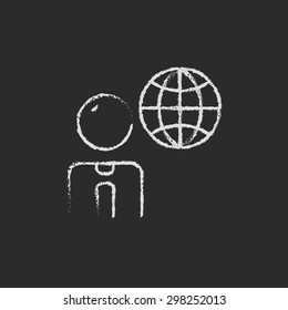 Businessman with global hand drawn in chalk on a blackboard vector white icon on a black background