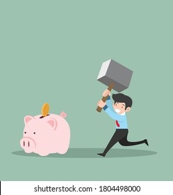 businessman hammer breaking piggy bank concept
