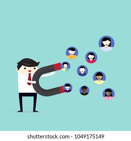 Businessman hand attracts customer with a large magnet