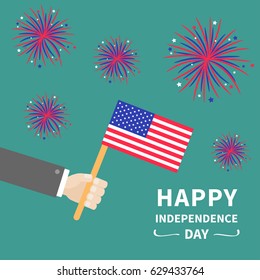 Businessman hand holding american flag. Star and strip. Firework set. Happy Independence day 4th of july Flat design. Green background. Vector illustration